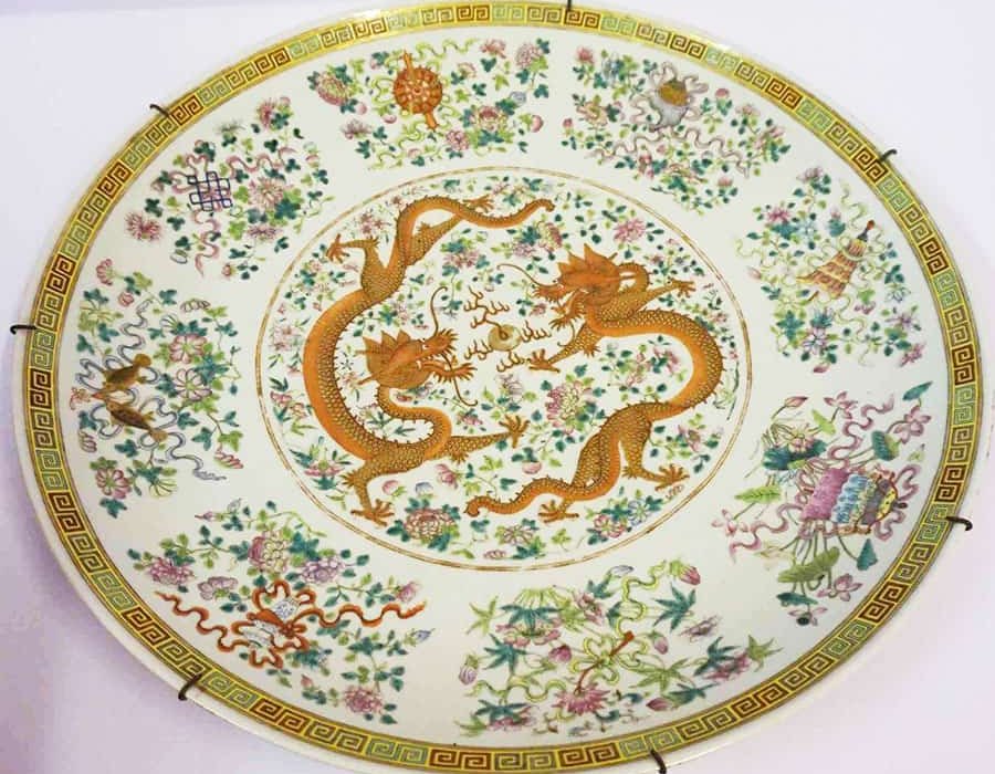 A Chinese Famille Rose charger with five-claw dragons sold at Browns