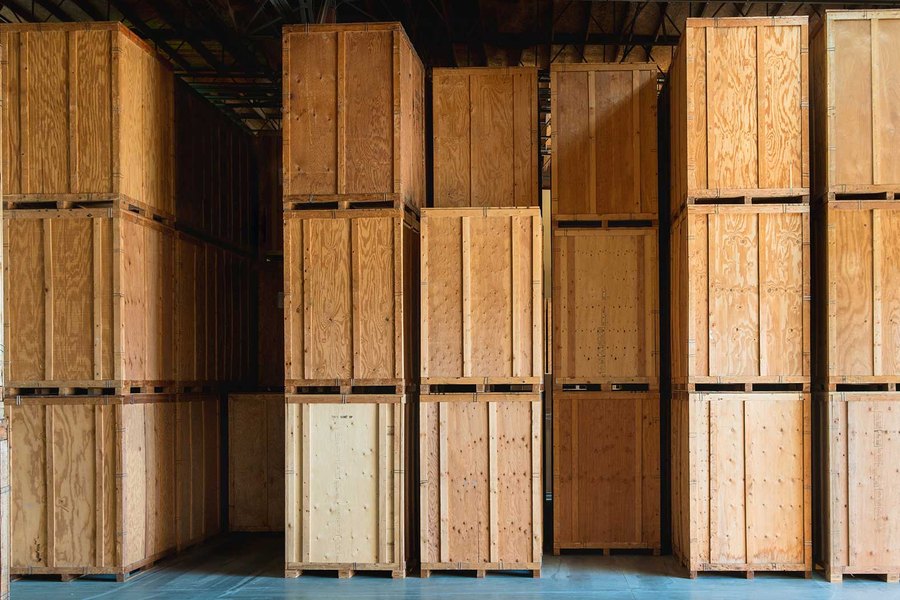 Stacked timber storage crates in the Browns warehouse